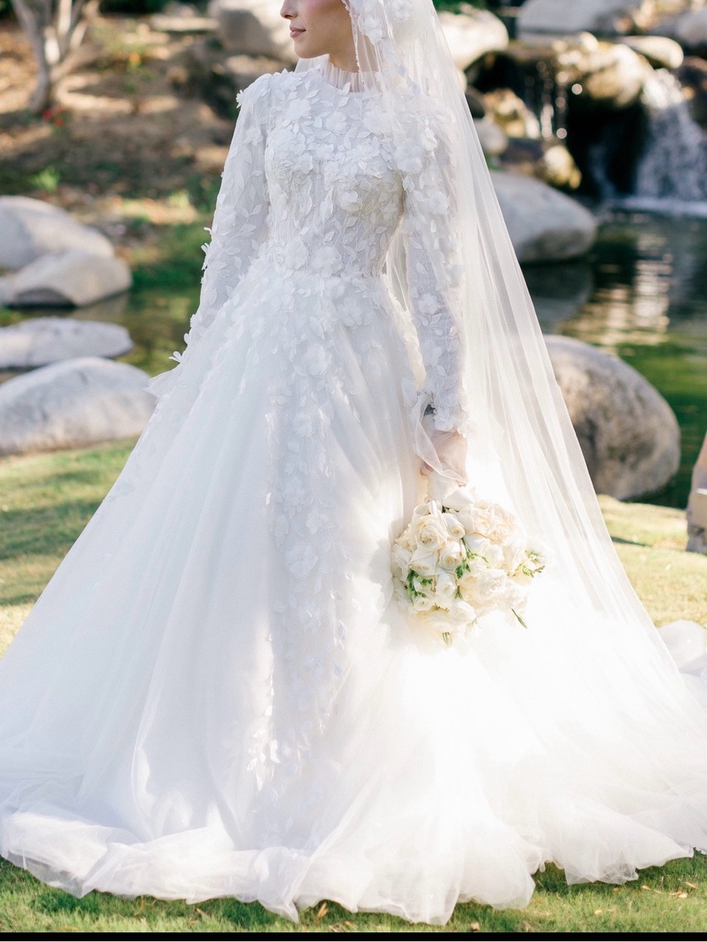 Elegant White Long-Sleeve Floral Appliqué Wedding Gown